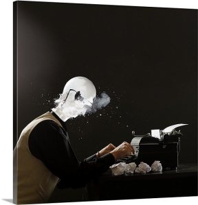 man-with-exploding-lightbulb-head-on-retro-typewriter-117149791